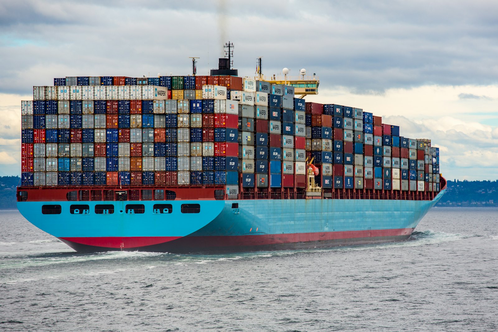 Fully loaded container vessel crossing the ocean